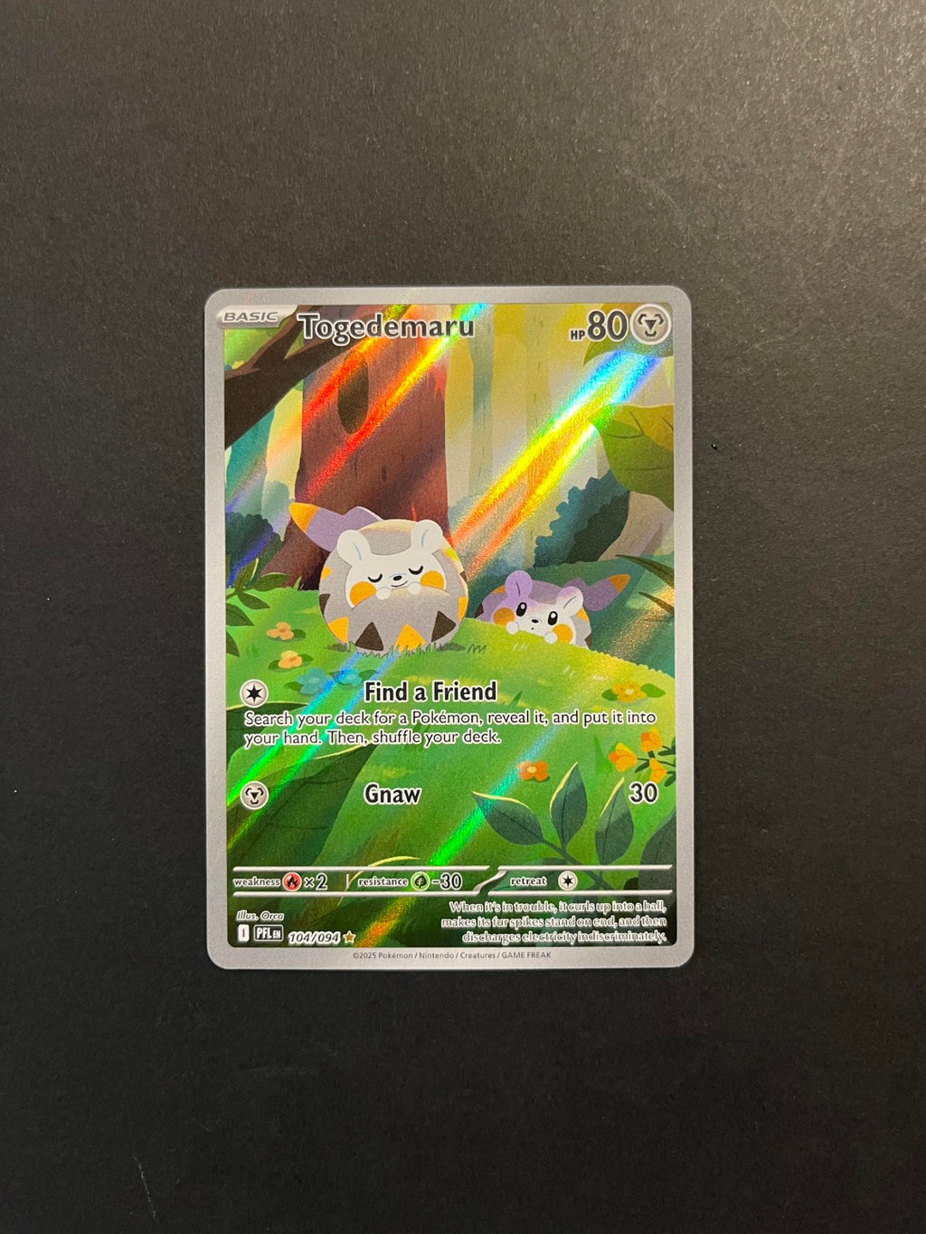 Togedemaru 104/094 ME02 Phantasmal Flames